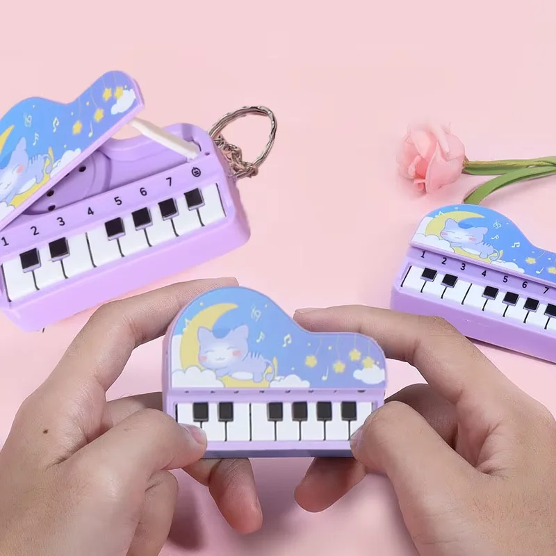Cute Mini Desktop Piano Keycha - Kids Education Music 评论和价格