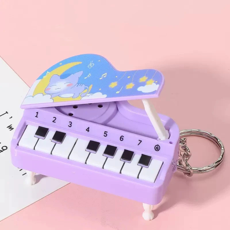 Cute Mini Desktop Piano Keycha - Kids Education Music 评论和价格